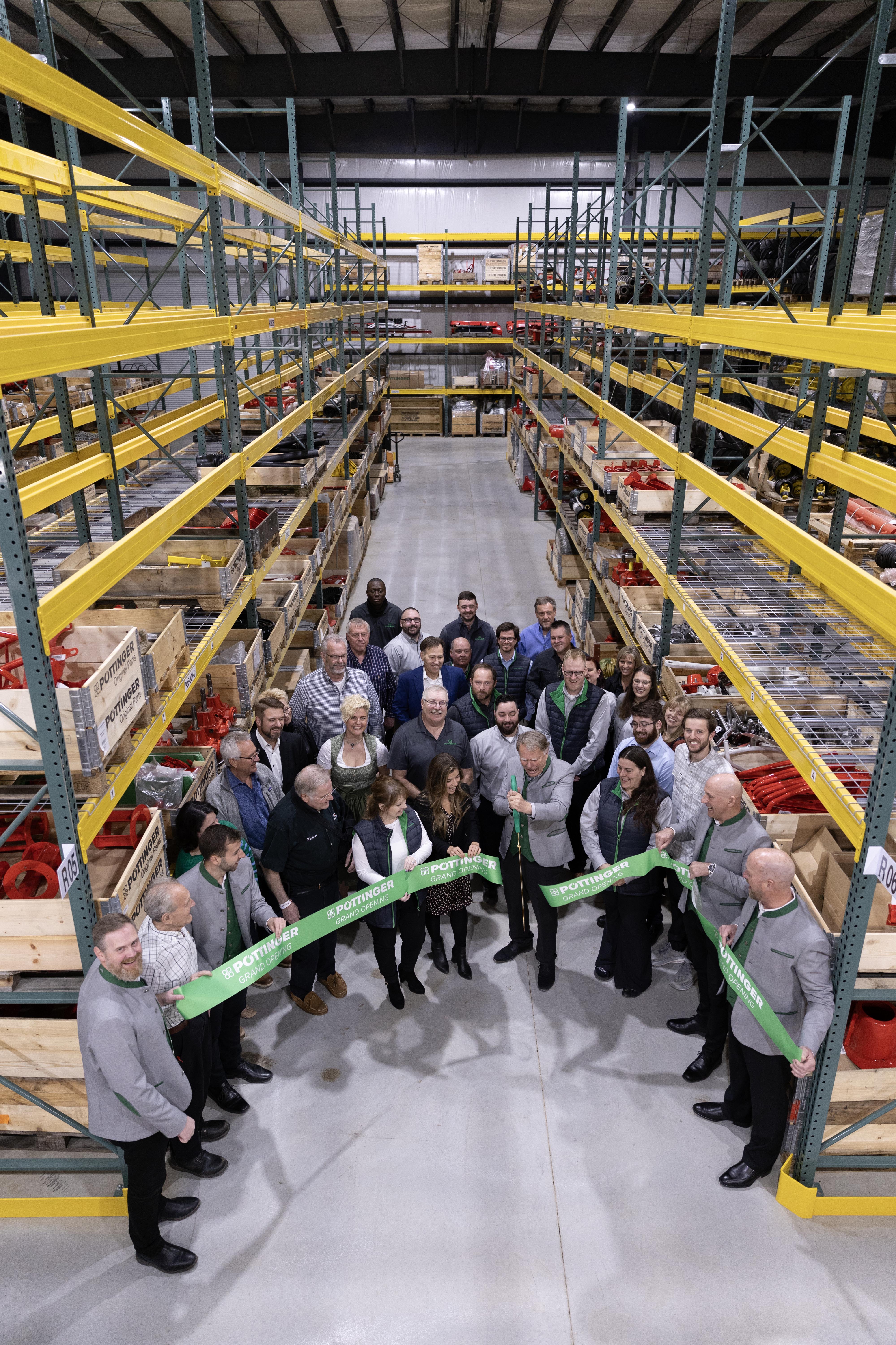 Poettinger ribbon cutting